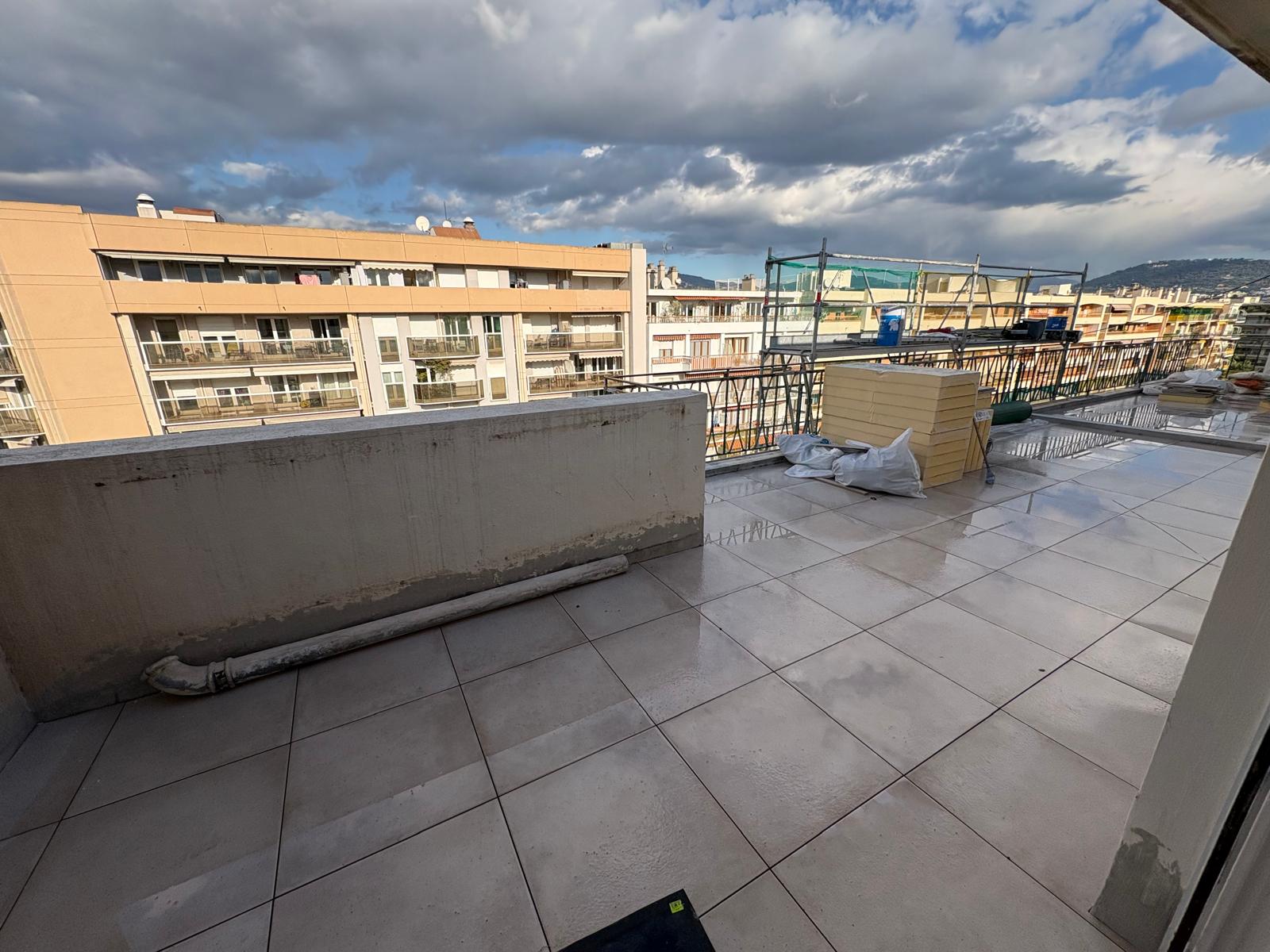 South-facing terrace with sea glimpse